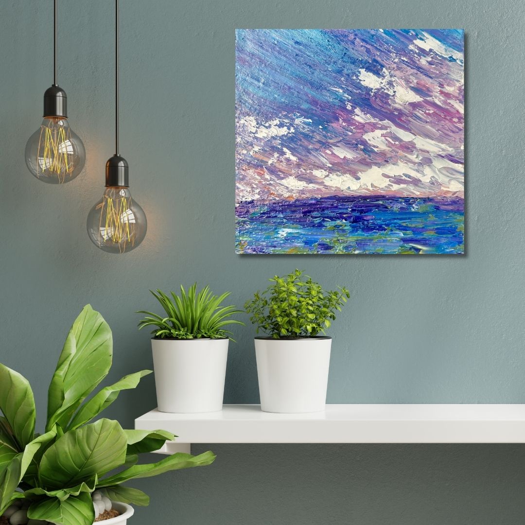 Artistic abstract painting by Ottawa artist Mireille Laroche on a wall with potted plants and hanging light bulbs.