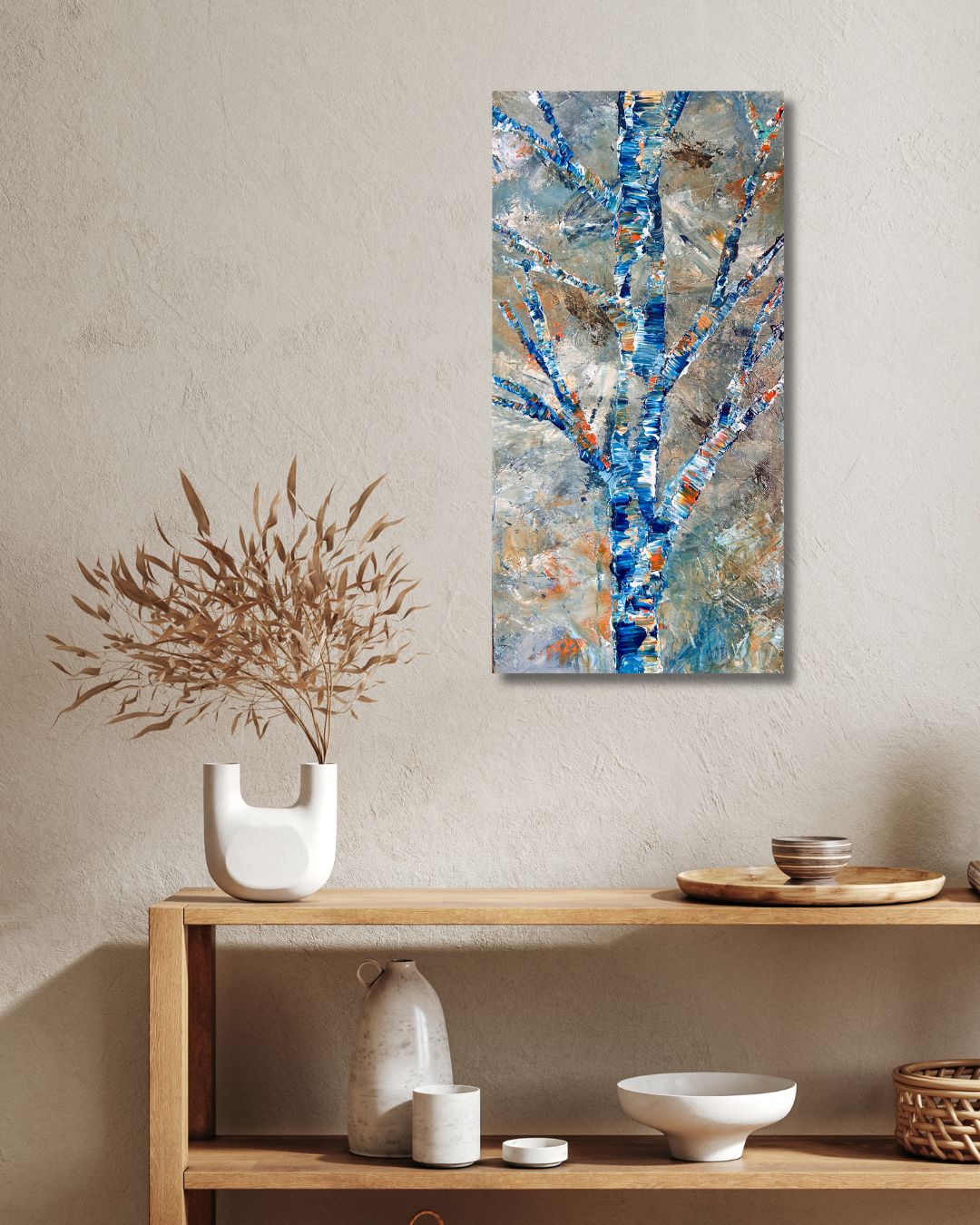 Original acrylic painting by Ottawa artist Mireille depicting a semi-abstract tree.   Painting on a beige wall above shelves with decorative items.