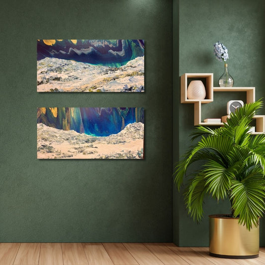 Two landscape paintings on a green wall with a plant and shelves below By Ottawa artist Mireille Laroche.