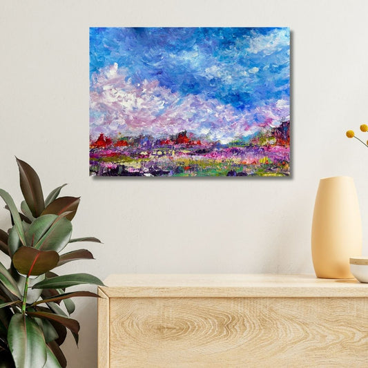 Colorful abstract painting by Ottawa artist Mireille Laroche  on a wall above a wooden console table with decorative items.