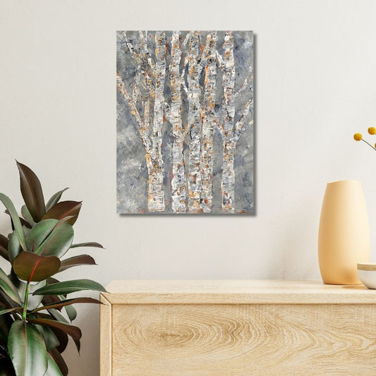 Abstract painting of trees  by Ottawa artist Mireille Laroche on a wall above a wooden console table with decorative items.