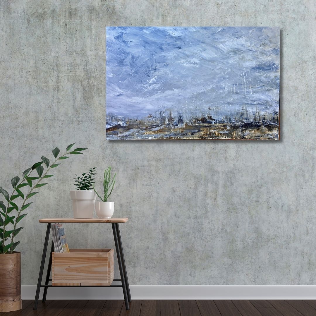 Abstract painting by Ottawa artist Mireille Laroche on a textured wall with a wooden side table and plants below.
