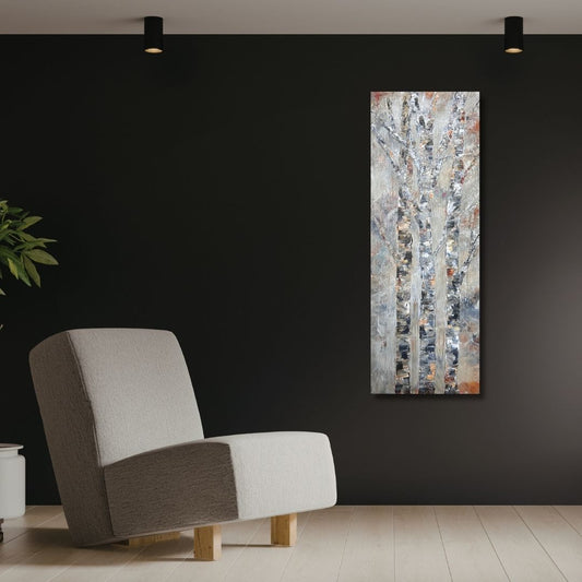 Original semi abstract painting of trees by Ottawa artist Mireille Laroche on a black wall and besides a modern chair