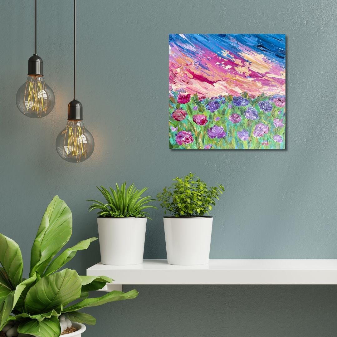 Floral painting with beautiful sunset by Ottawa artist Mireille Laroche above a shelf with plants