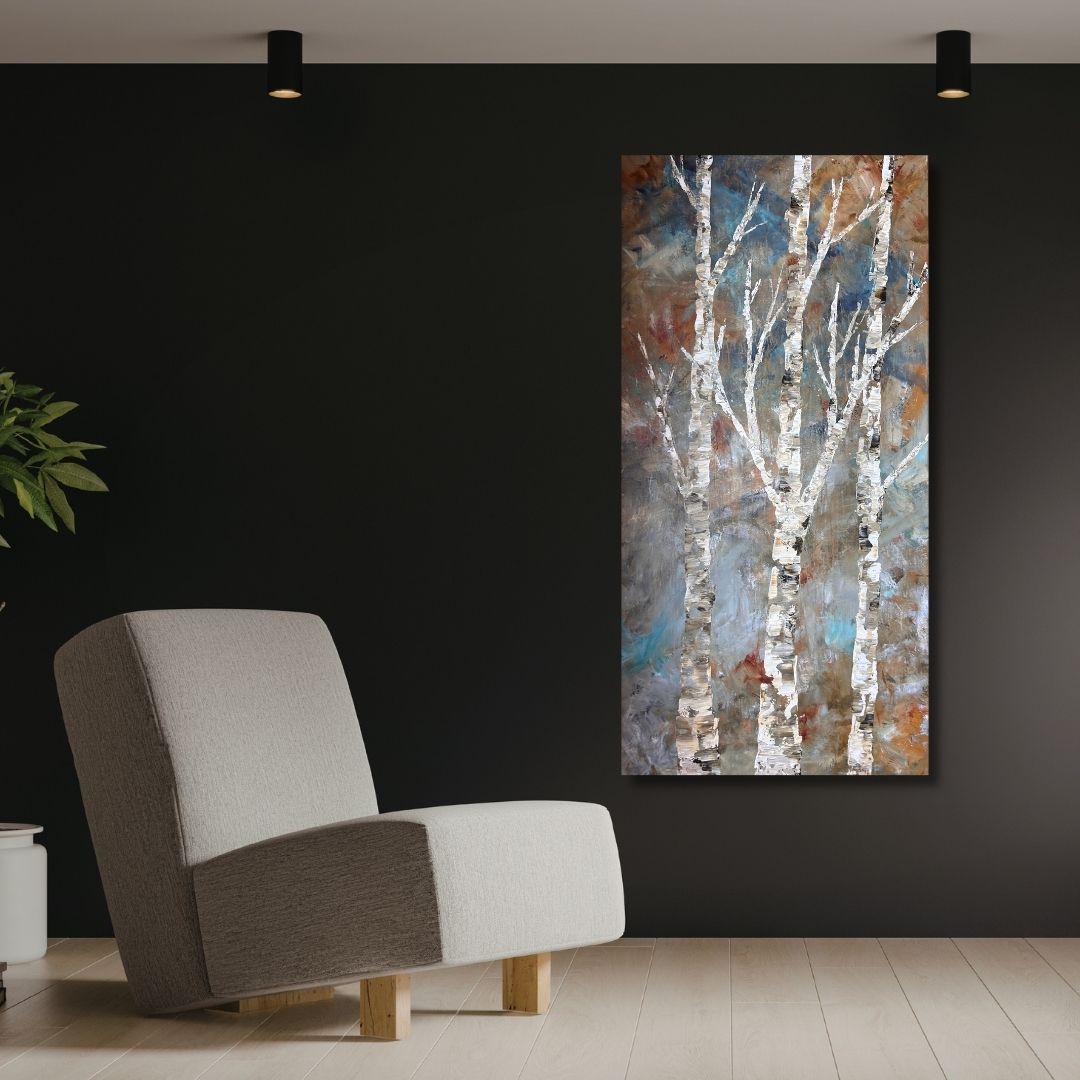 Abstract painting of birch trees by Ottawa artist Mireille Laroche on a black wall by a modern chair