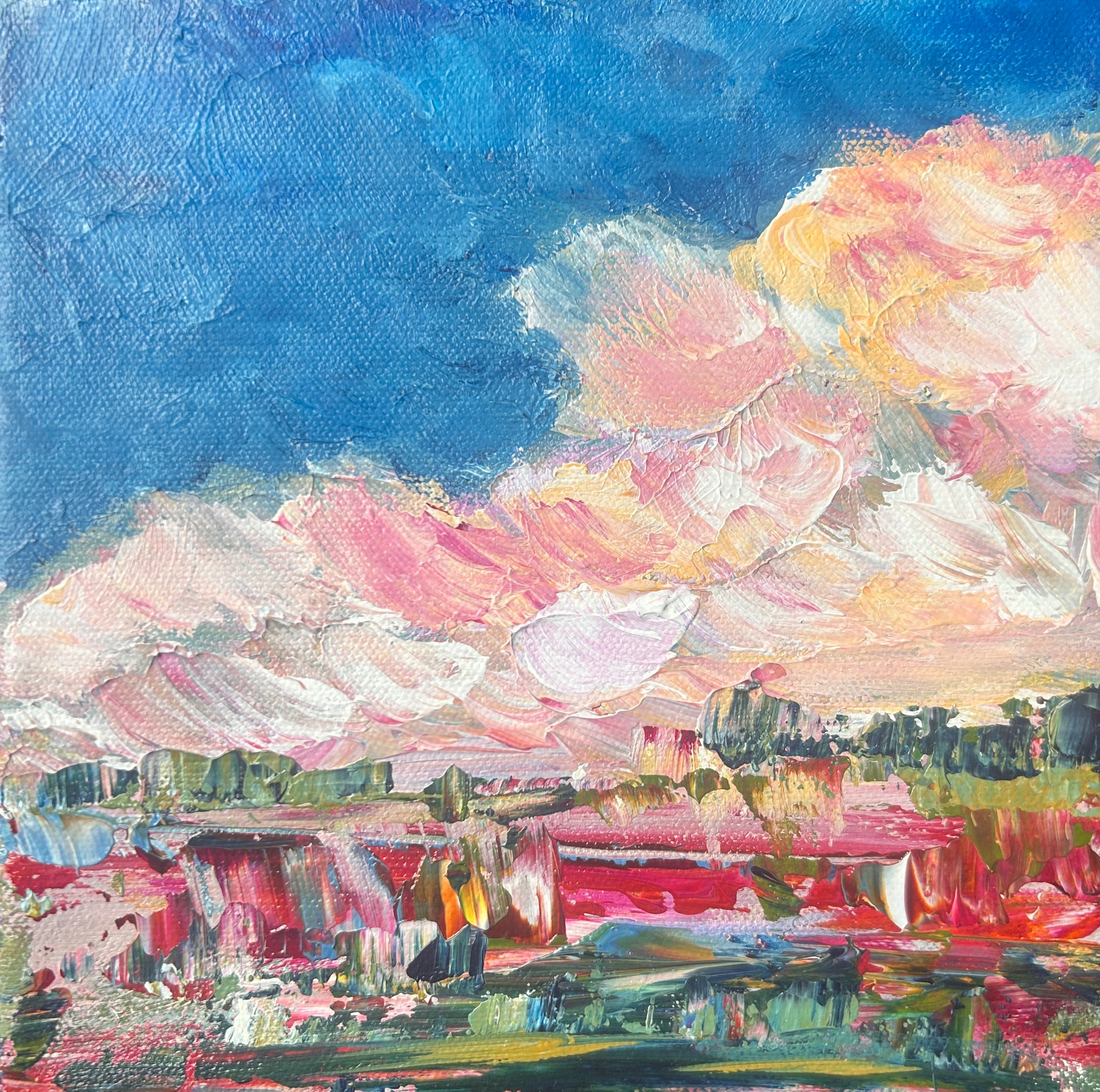 Abstract painting of a landscape with colorful clouds by Ottawa artist Mireille Laroche